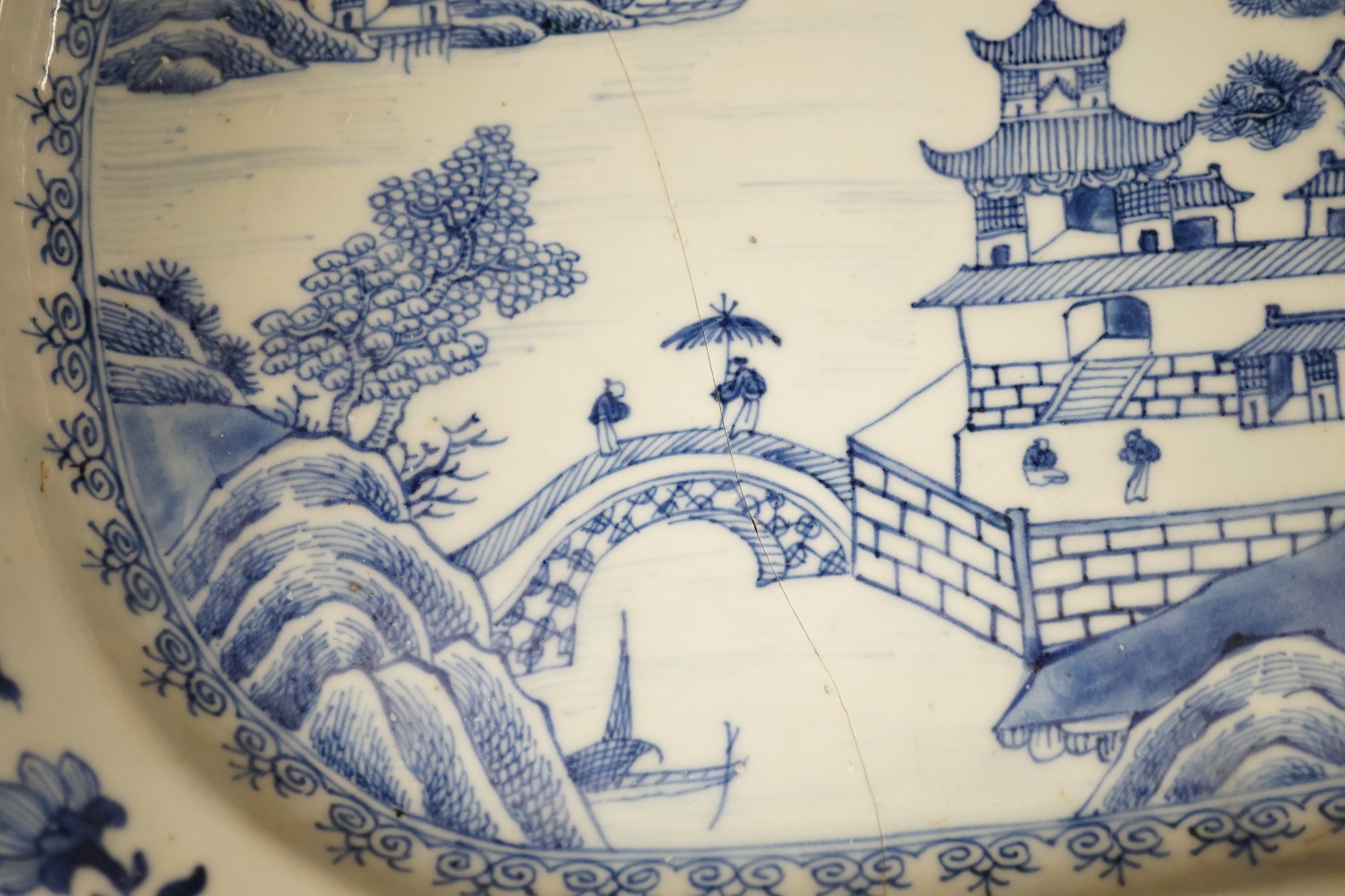 Three 18th century Chinese blue and white meat plates, largest, 41.5cm wide, 35cm deep (a.f.)